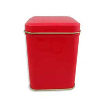 small red tea tin